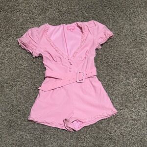 Sugar Thrillz/ Dolls Kill Chic Manners Pink Short Sleeve Ruffle Romper with Belt